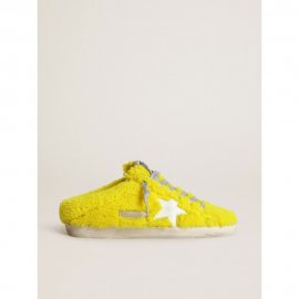 Super-Star Sabots in fluorescent yellow shearling with white leather star